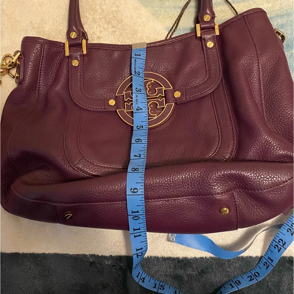 Tory Burch purple bag.